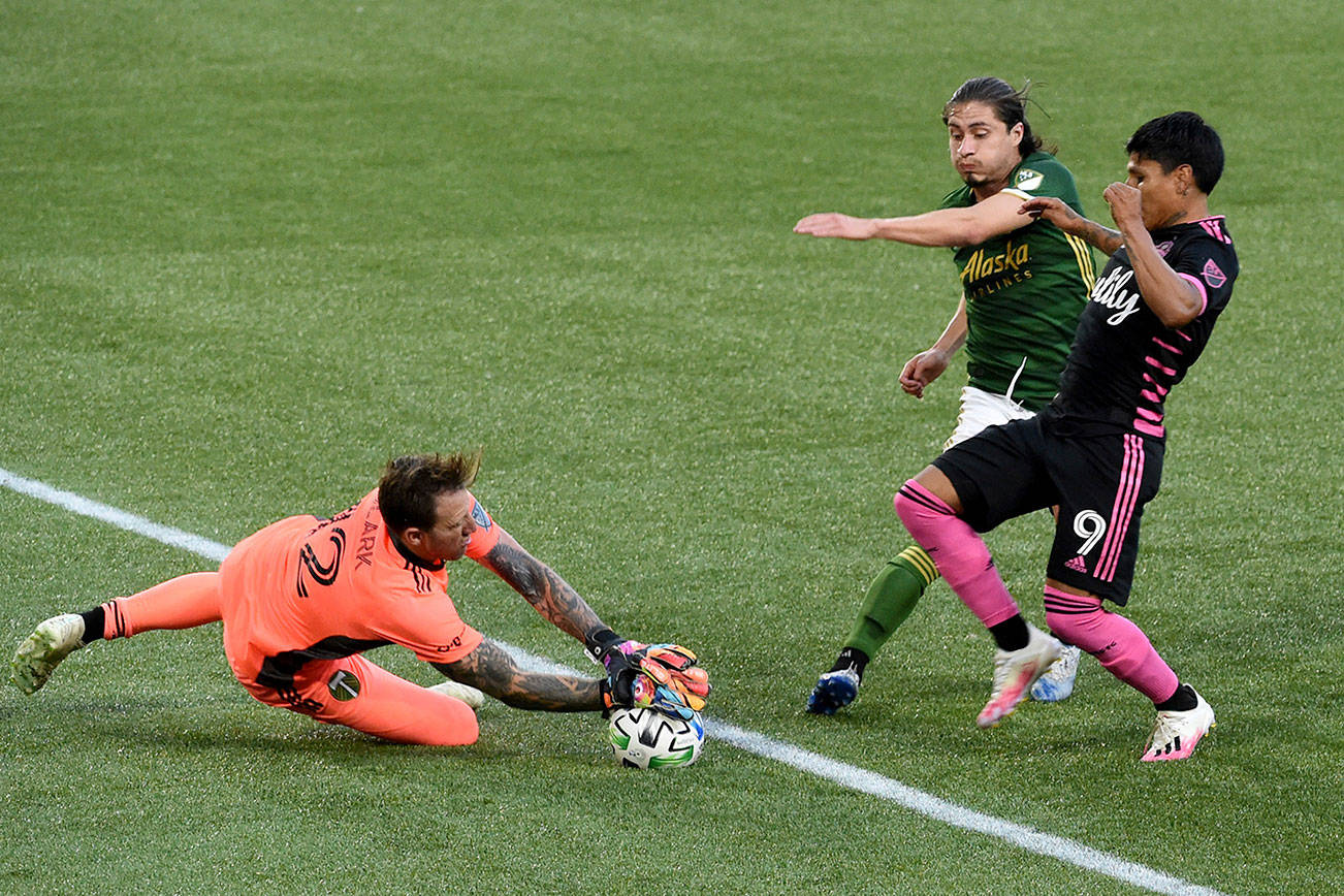 MLS SOCCER: Sounders beat Timbers on trio of late goals