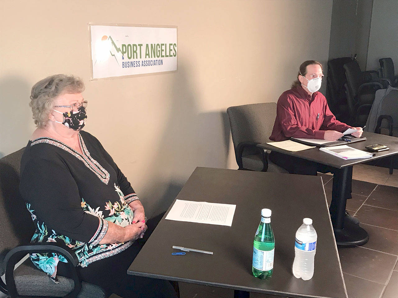 Patti Morris, left, and Rick Paschall, candidates for Clallam County Public Utility District commissioner, were featured Tuesday at a Port Angeles Business Association general election forum. (Paul Gottlieb/Peninsula Daily News)