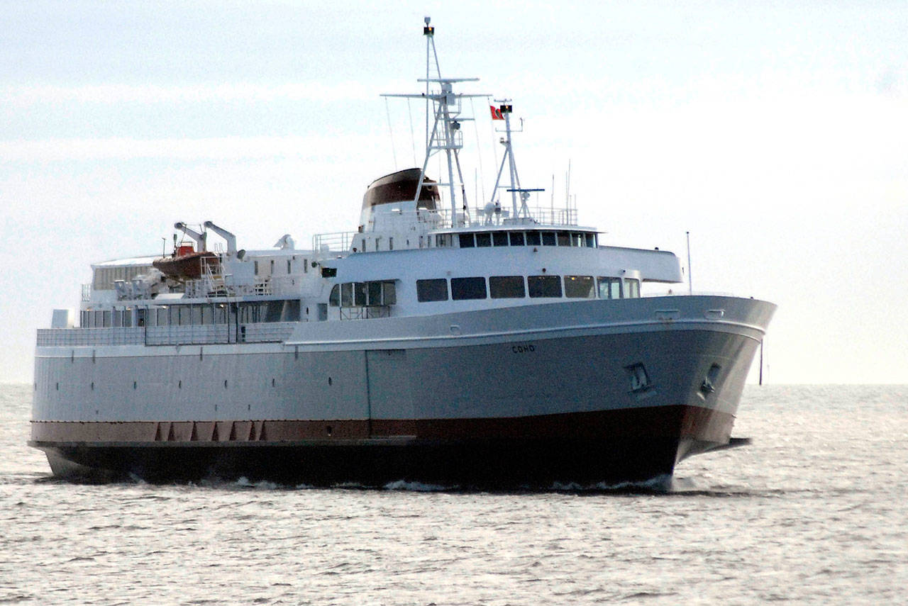The ferry MV Coho plies the waters Port Angeles Harbor during a maintenance sailing in May. (Keith Thorpe/Peninsula Daily News file)