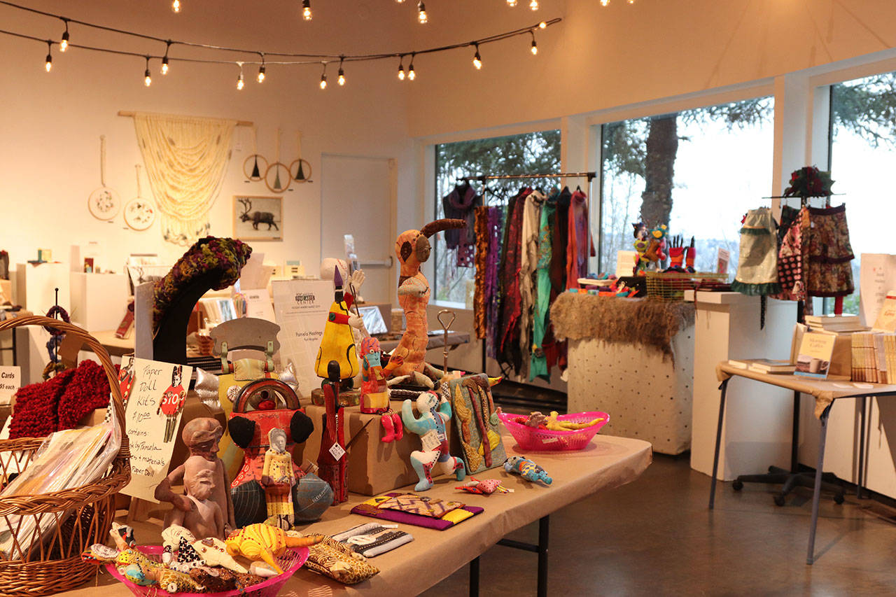 Pamela Hastings’ one-of-a-kind artist dolls (front, left) were crowd favorites at the Port Angeles Fine Arts Center’s 2019 Holiday Makers Market. (Photo courtesy of Port Angeles Fine Arts Center)