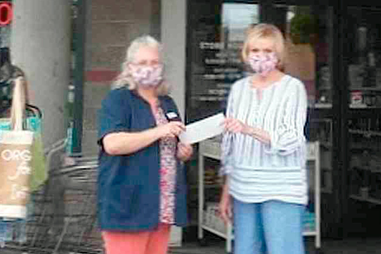 Pharmacy donates to Peninsula animal charity