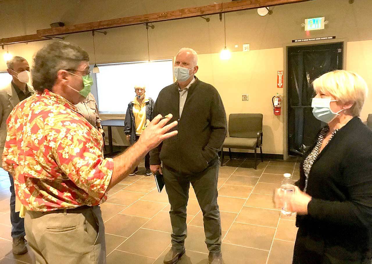 Port Angeles Business Association election forum moderator Andrew May, left, explains the program format to 24th Legislative District incumbent Sen. Kevin Van De Wege and challenger Connie Beauvais on Tuesday, Sept. 15, 2020. (Paul Gottlieb/Peninsula Daily News)