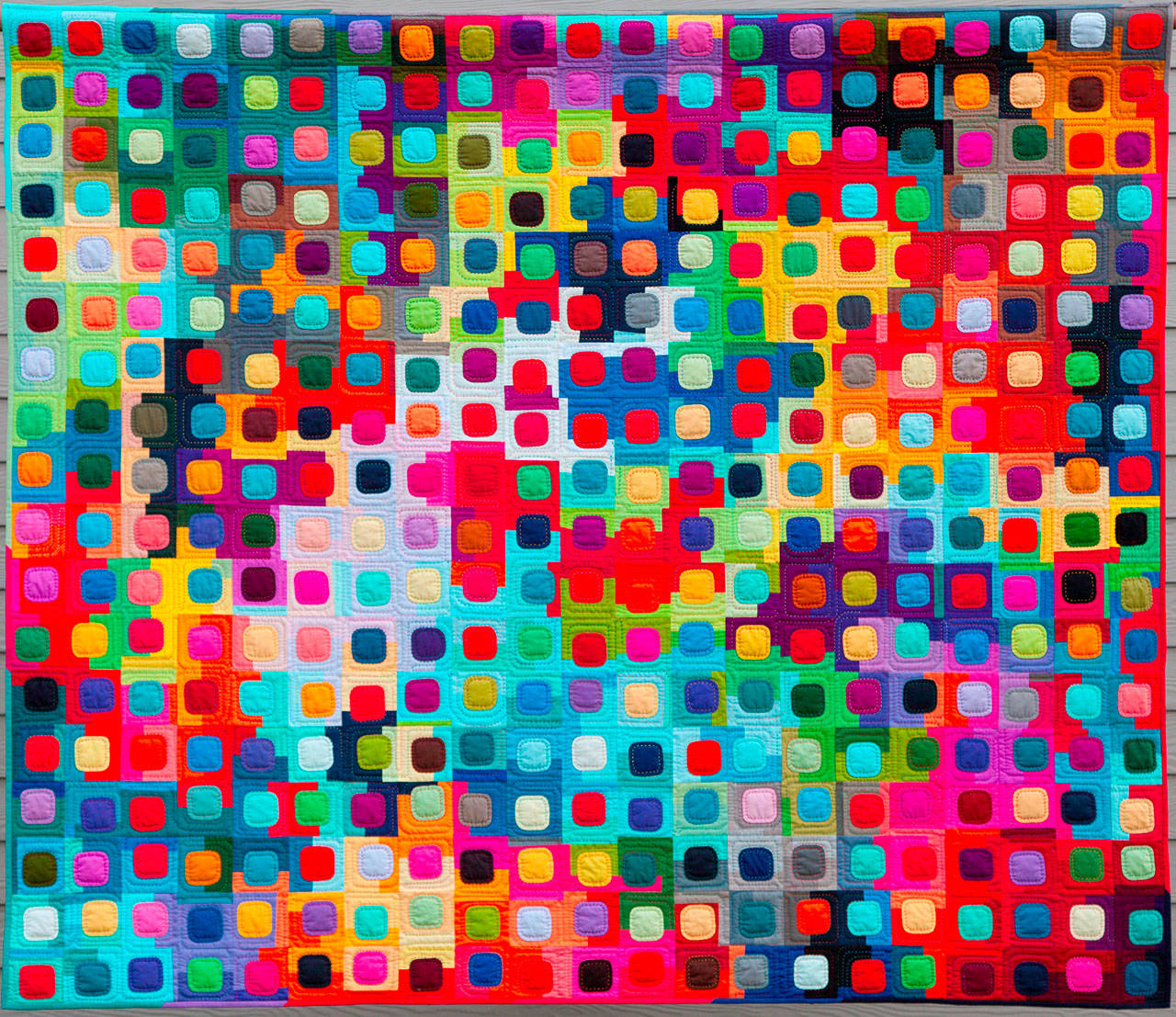 “For the Love of Squircles” by Sequim fiber artist Marla Varner is among the fiber pieces on display.