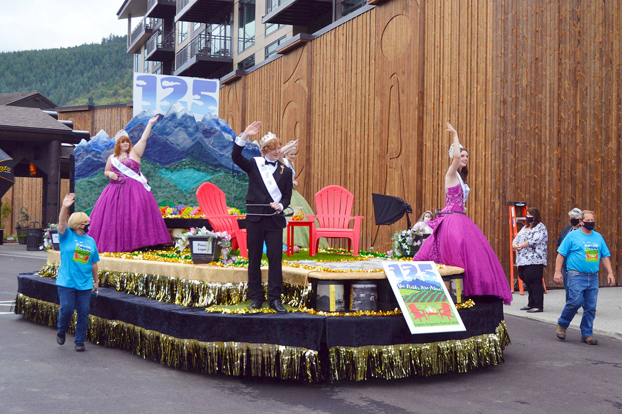 Locals can watch the 125th Sequim Irrigation Festival’s Grand Parade, now a procession due to COVID-19 regulations, at <a href="http://www.irrigationfestival.com" target="_blank">irrigationfestival.com</a> at 5 p.m. Saturday, Oct. 10. Here, festival royalty and organizers ride the float for the first time on Sept. 19. Other events run throughout the day online as well. The only in-person event is the Innovative Arts and Crafts Fair at the Sequim Farmers Market. (Matthew Nash/Olympic Peninsula News Group)