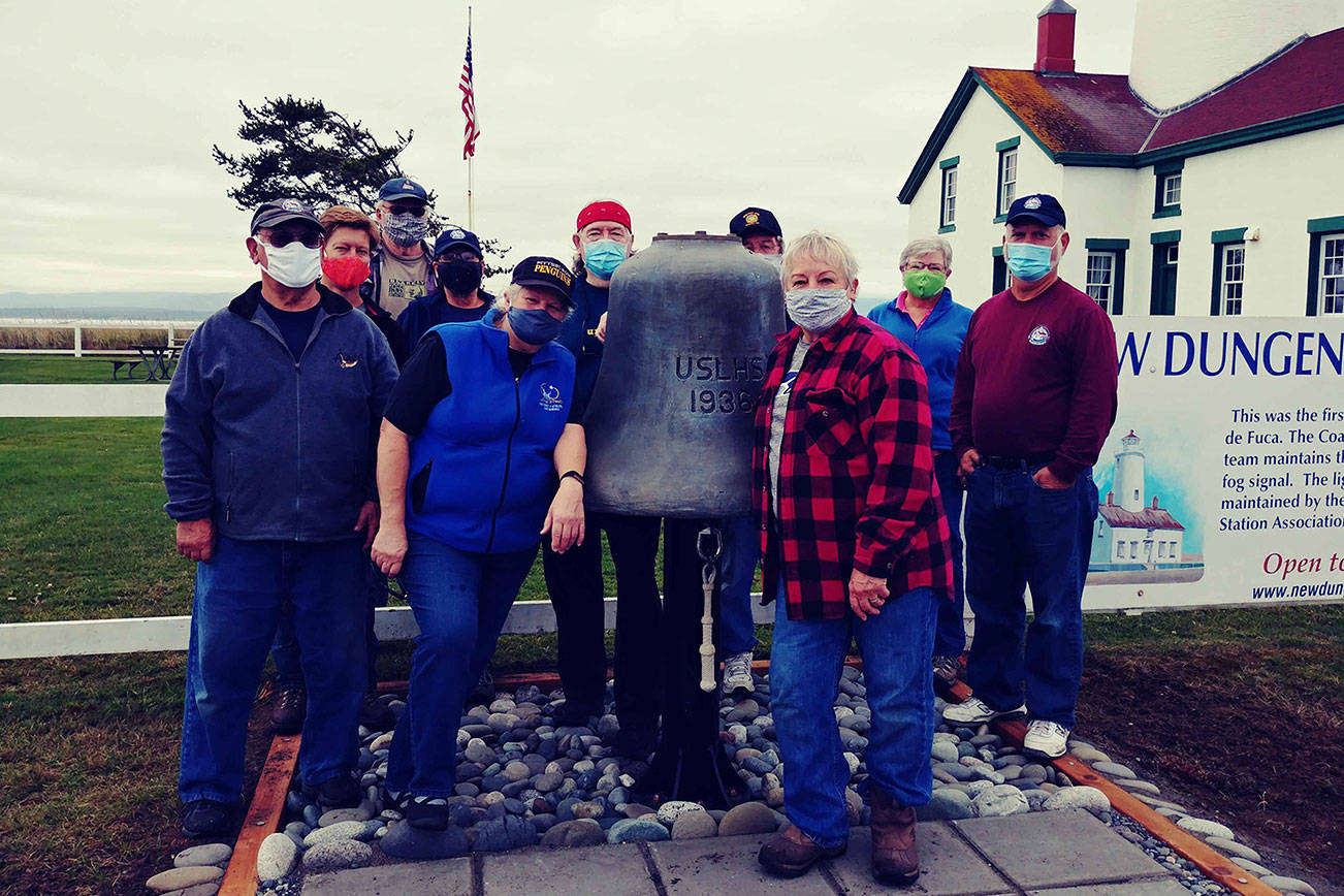 The volunteer work crew at the New Dungeness Lighthouse include, from left, Joe Bacher, Chad Kaiser, Bill Bjorklund, Sarah Miller, Melody Monson, Greg MacDonald, Ken Davidson, Julie Bacher, Nancy Klotz and Duane Klotz. Photo Marty LaMarr