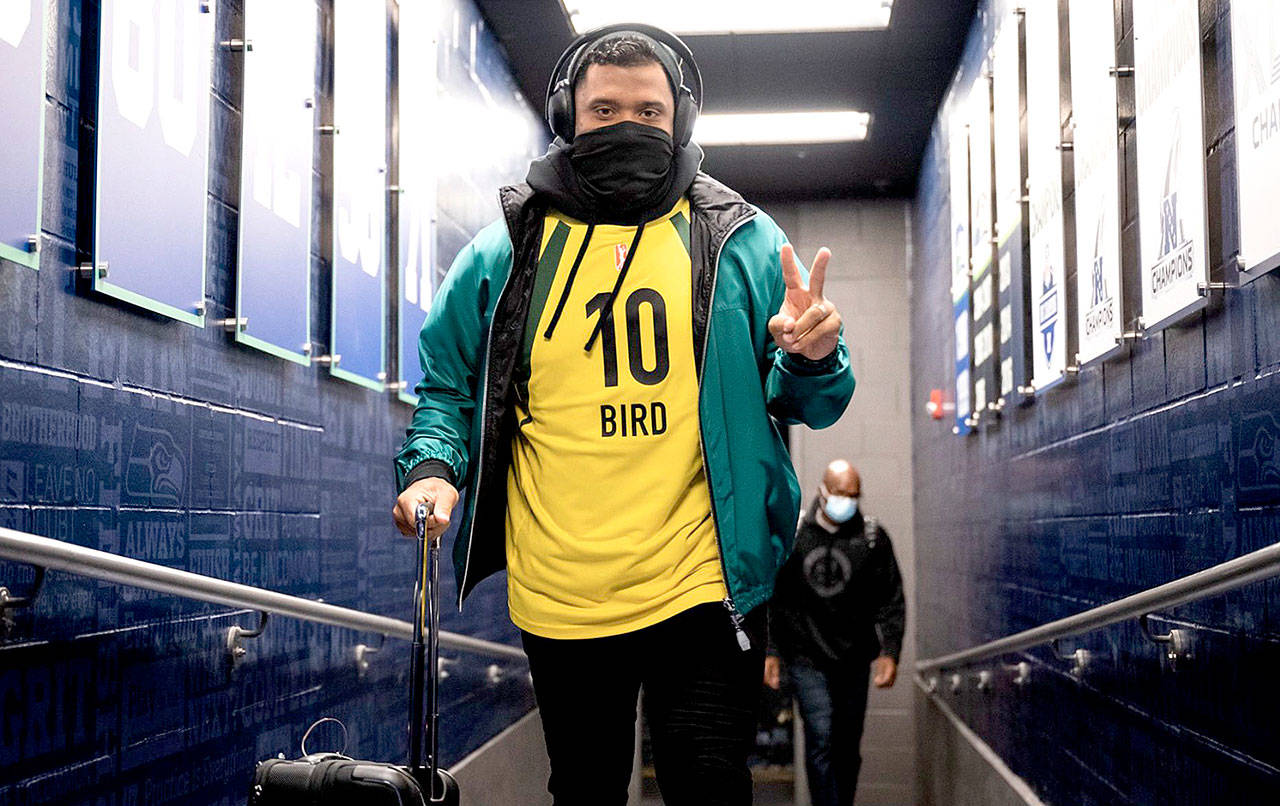 A photo Russell Wilson posted on his Twitter account of him wearing a Sue Bird jersey Sunday night before his game against the Vikings.