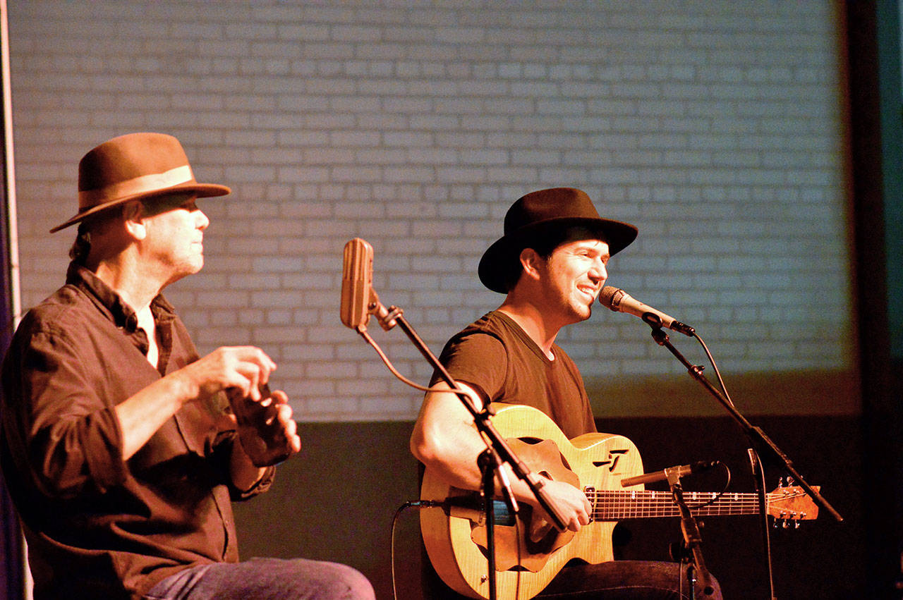 Harmonica man Bob Beach, left, will have a cross-country musical conversation with David Jacobs-Strain on Friday. The duo, seen here at the 2015 Juan de Fuca Festival in Port Angeles, will do a free online concert. (Diane Urbani de la Paz/for Peninsula Daily News)