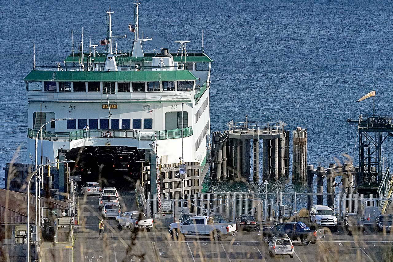 Vehicles are loaded onto the MV Salish ferry boat at the terminal in Port Townsend earlier this month. Cost-saving options floated by the state Department of Transportation for the 2021-23 budget include pulling the Salish from service, which would leave the Port Townsend-Coupeville route with one boat. (Nicholas Johnson/Peninsula Daily News)