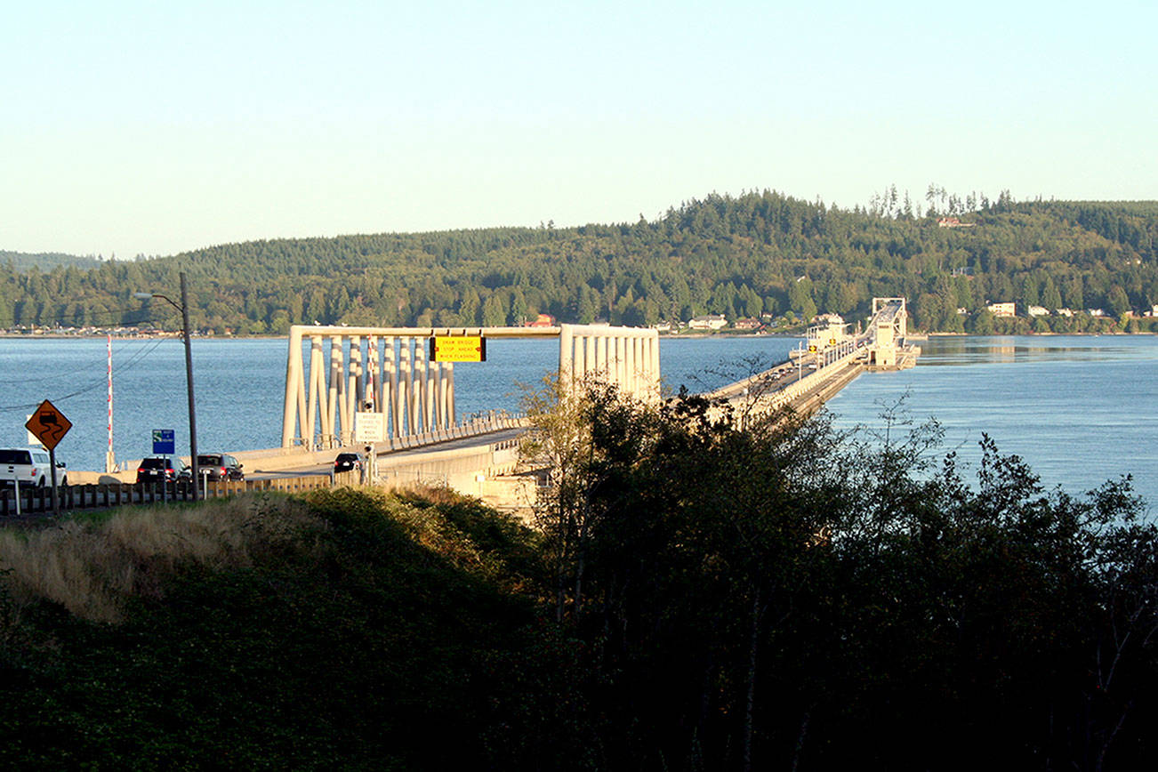 Traffic crosses the Hood Canal Bridge along state Highway 104 on Wednesday evening. The Peninsula Regional Transportation Planning Organization is examining all modes of transit in its 2040 draft plan, which is open for public comment through Oct. 18. (Brian McLean/Peninsula Daily News)