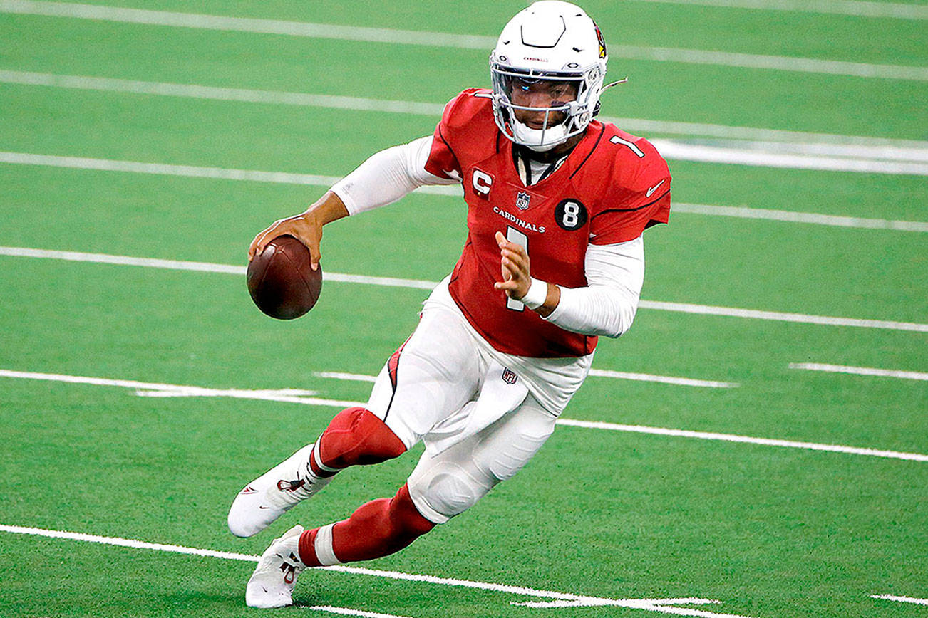 Arizona Cardinals quarterback Kyler Murray (1) looks to throw during an NFL Football game in Arlington, Texas, Monday, Oct. 19, 2020. (AP Photo/Michael Ainsworth)