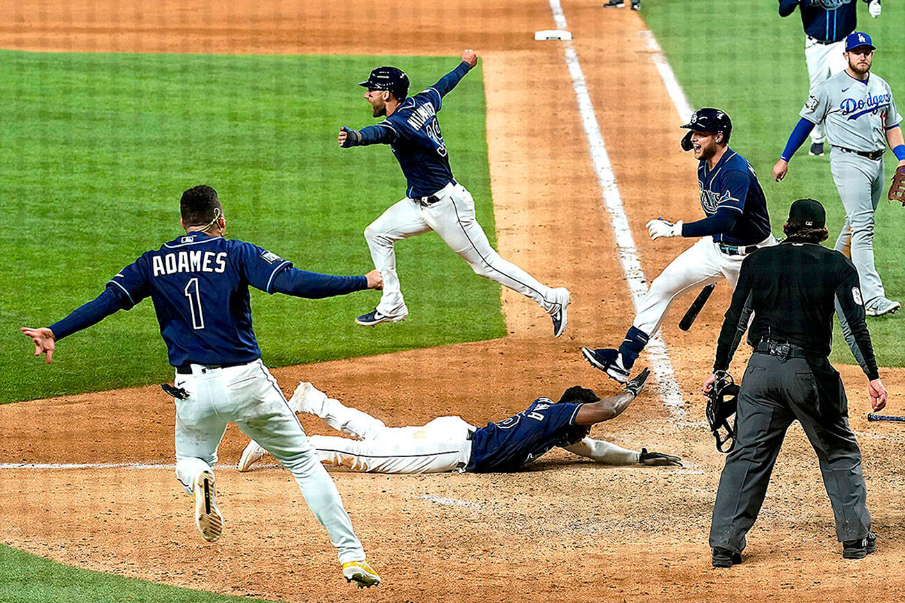 during the == inning in Game 4 of the baseball World Series Saturday, Oct. 24, 2020, in Arlington, Texas. Rays defeated the Dodgers 8-7 to tie the series 2-2 games. (AP Photo/Eric Gay)