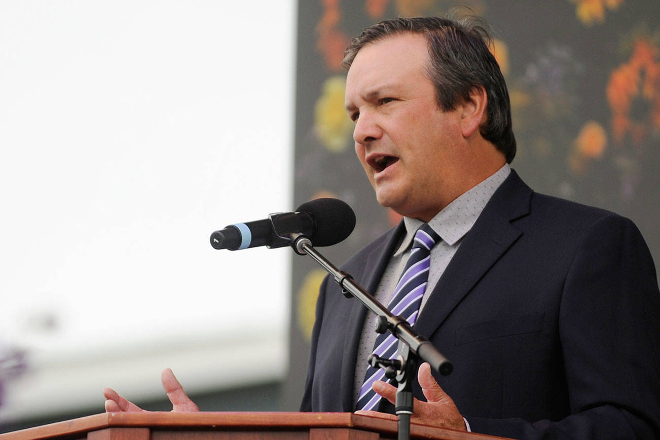 Sequim High School principal Shawn Langston speaks at the school’s 2020 graduation ceremony. The longtime administrator has been placed on leave. Michael Dashiell/Olympic Peninsula News Group