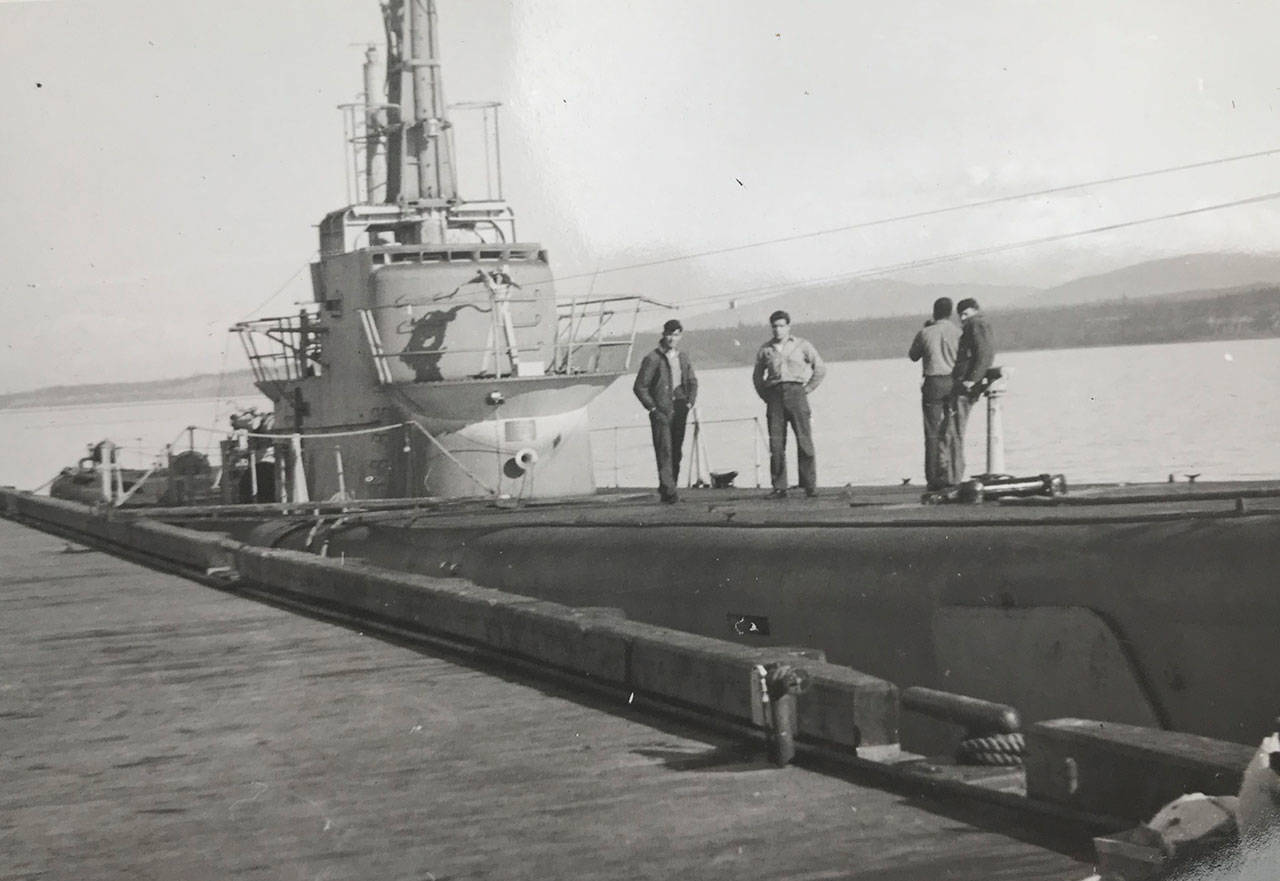 Tambor docked at Coast Guard Air Station with unidentified men aboard. (Nancy VanSickle collection)