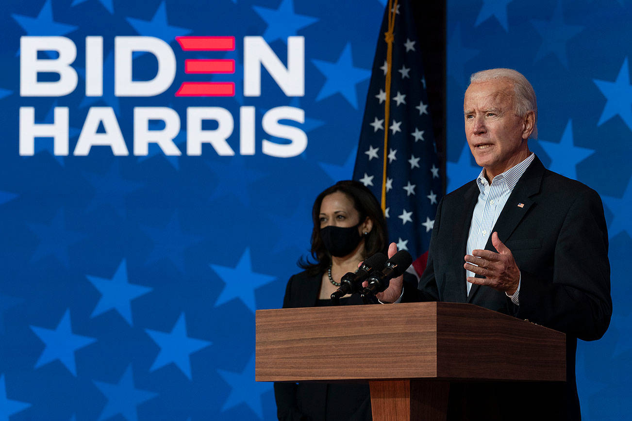 Democratic presidential candidate former Vice President Joe Biden joined by Democratic vice presidential candidate Sen. Kamala Harris, D-Calif., speaks at the The Queen theater Thursday, Nov. 5, 2020, in Wilmington, Del. (AP Photo/Carolyn Kaster)