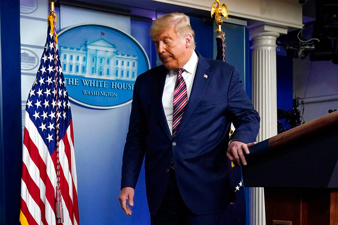 President Donald Trump leaves the podium after speaking at the White House, Thursday, Nov. 5, 2020, in Washington. (AP Photo/Evan Vucci)