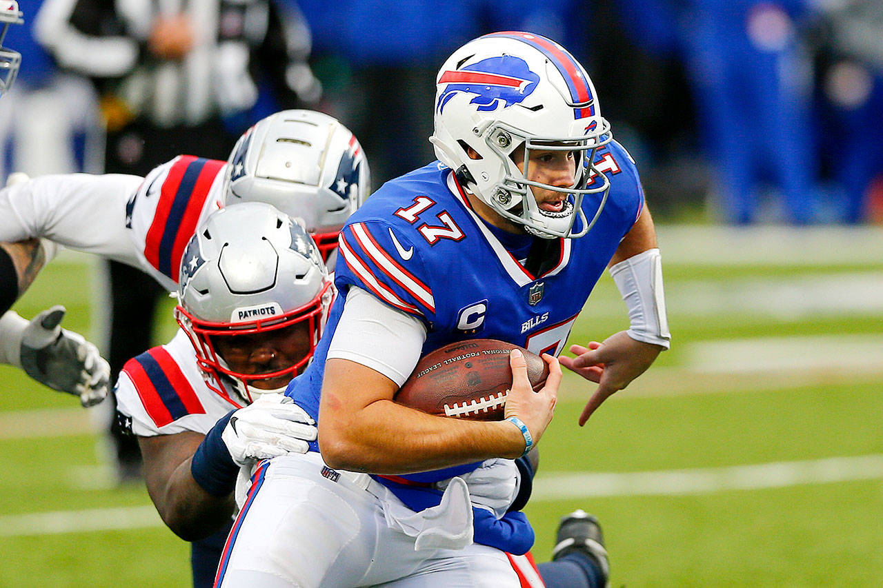 Buffalo Bills quarterback Josh Allen (17) is tackled by New England Patriots’ Ja’Whaun Bentley (51) during the second half of an NFL football game Sunday, Nov. 1, 2020, in Orchard Park, N.Y. (John Munson/Associated Press)