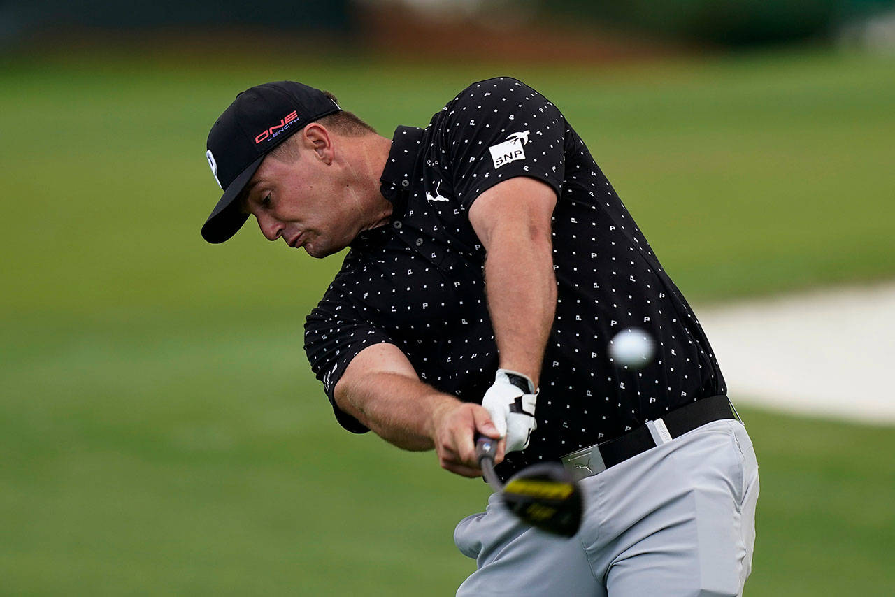Bryson DeChambeau tees off on the third hole during a practice round for the Masters golf tournament Tuesday, Nov. 10, 2020, in Augusta, Ga. (David J. Phillip/Associated Press)