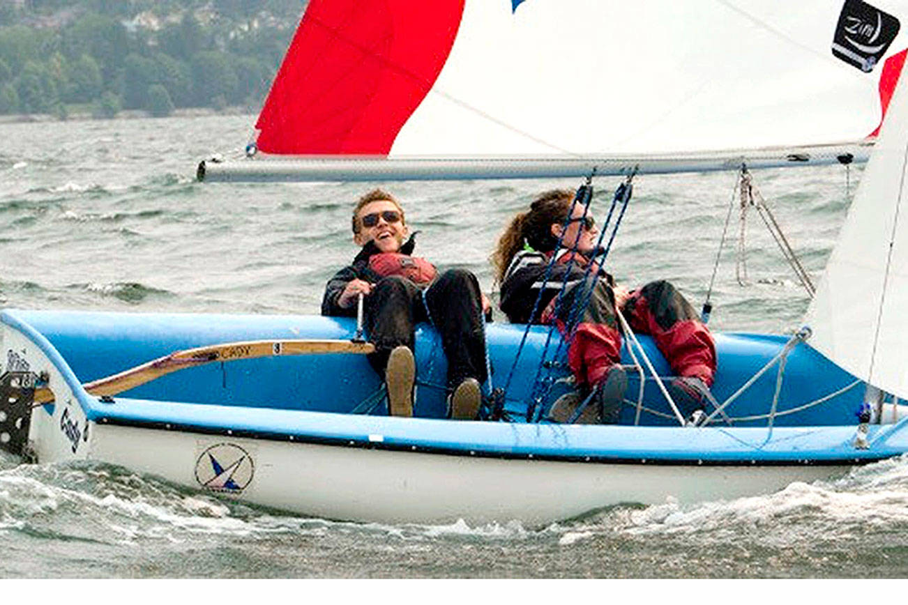 From left, Cedric Wesley Keneipp and Mallory Hood, both of Bellingham, sail in Bellingham Bay. They are part of Barely Legal Racing, a team of 19- to 22-year-olds that plan to compete in the Race to Alaska in 2021.