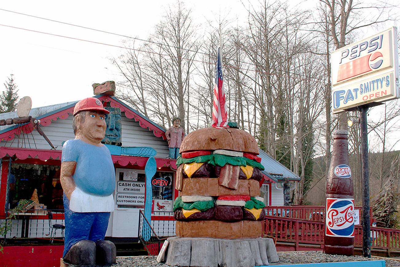 Fat Smitty's restaurant in Discovery Bay has been subjected to three burglaries this year, with thieves stealing dollar bills that patrons personalize and attach to the walls and ceiling. Thursday's latest robbery is the first time law enforcement have been able to catch the suspect thieves, however it is still under investigation if Thursday's robbers are connected to the prior robberies. (Zach Jablonski/Peninsula Daily News)