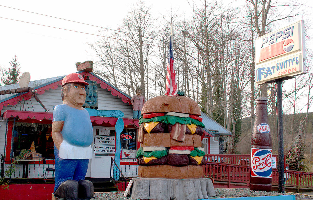 Fat Smitty’s restaurant in Discovery Bay has been subjected to three burglaries this year, with thieves stealing dollar bills that patrons personalize and attach to the walls and ceiling. Thursday’s latest robbery is the first time law enforcement have been able to catch the suspect thieves, however it is still under investigation if Thursday’s robbers are connected to the prior robberies. (Zach Jablonski/Peninsula Daily News)