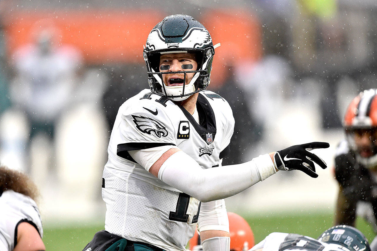 Philadelphia Eagles quarterback Carson Wentz stands at the line during a game against the Cleveland Browns on Nov. 22 in Cleveland. The Browns won 22-17. (David Richard/Associated Press)
