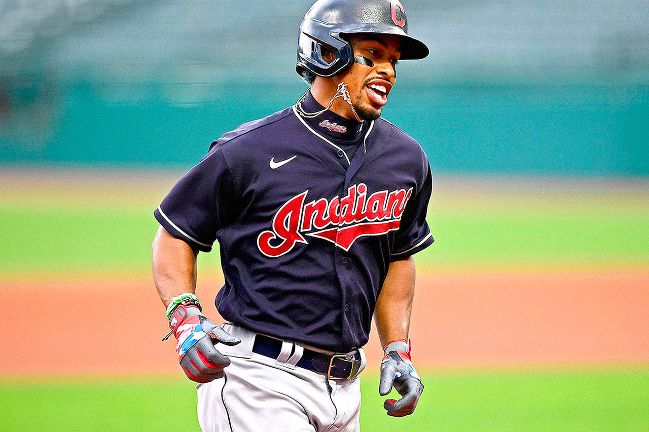 FILE - In this July 10, 2020, file photo, Cleveland Indians' Francisco Lindor runs the bases after hitting a home run during a simulated game at Progressive Field in Cleveland. The Indians are changing their name after 105 years, a person familiar with the decision told The Associated Press on Sunday, Dec. 13, 2020. After months of internal discussion prompted by public pressure and a national movement to remove racist names and symbols, the team is moving away from the name it has been called since 1915, said the person who spoke on condition of anonymity because the team has not revealed its plans. (AP Photo/David Dermer, File)