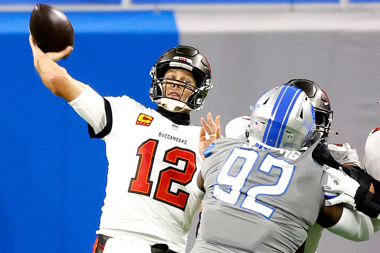 Tampa Bay Buccaneers quarterback Tom Brady (12) passes in the first half against the Detroit Lions during an NFL football game, Saturday, Dec. 26, 2020, in Detroit. (AP Photo/Rick Osentoski)