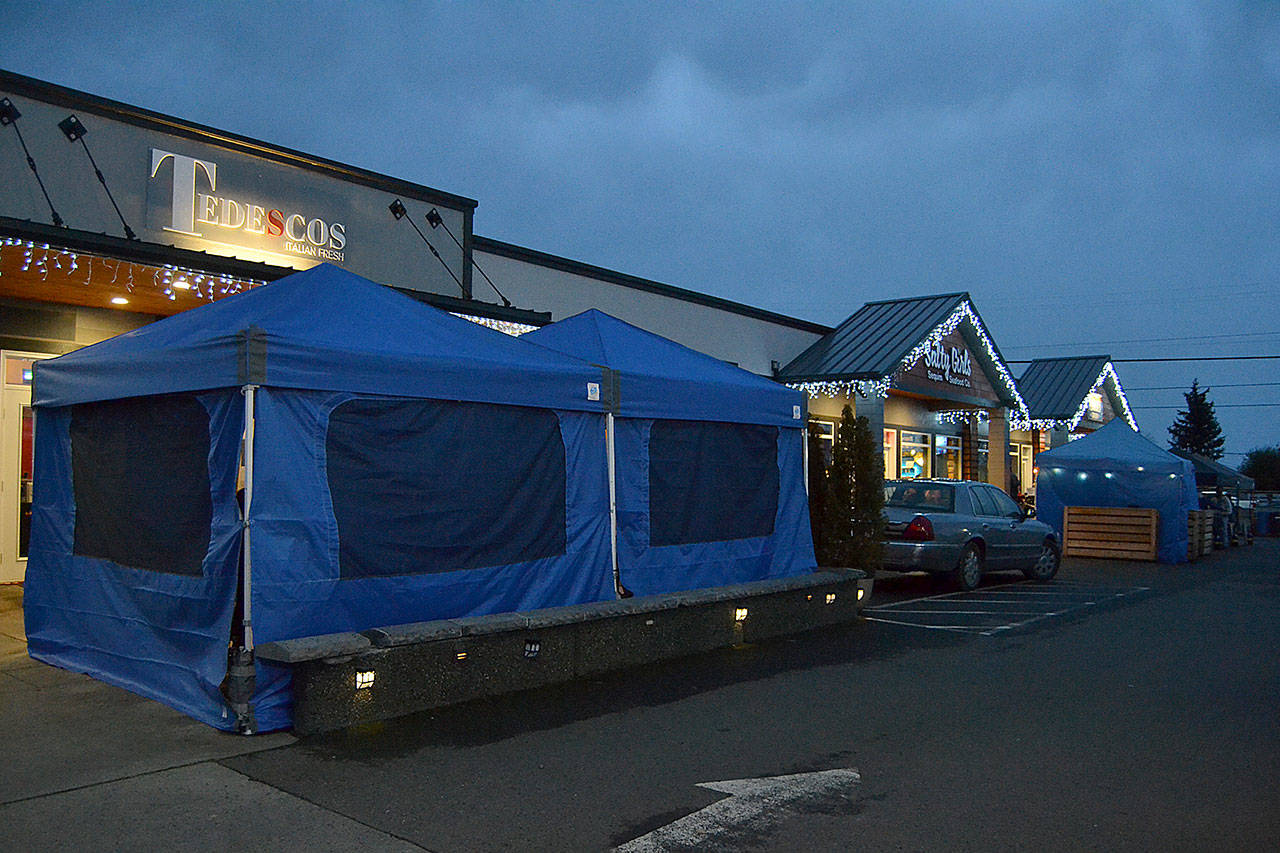 A new program through the City of Sequim provides information for eateries looking to set up outside dining under canopy tents. Barry Berezowsky, director of the Department of Community Development, said permits aren’t required, but city staff need a plat drawing, insurance information and safety protocols to ensure the tent is secure. (Matthew Nash/Olympic Peninsula News Group)