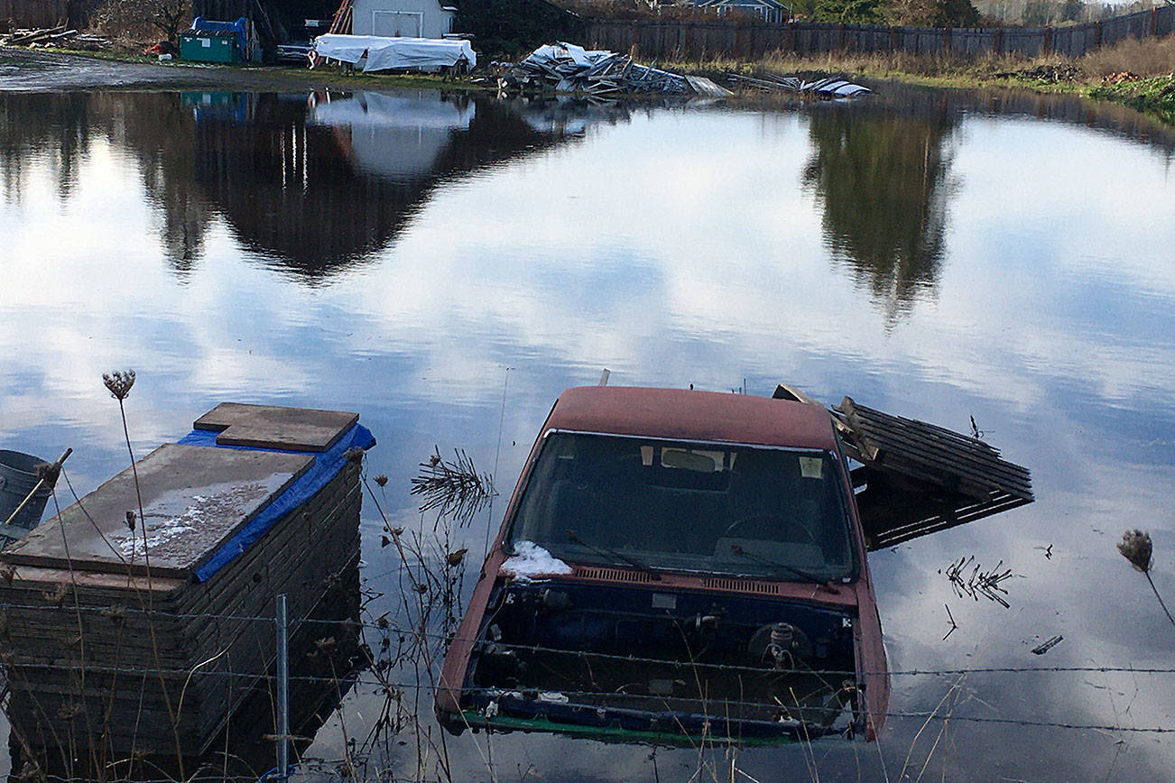 Portions of Seventh Avenue, including the 900 block of South Seventh Avenue, saw flooding from heavy rains, blocked storm drains and/or flooded stormwater ponds on Dec. 21. Matthew Nash/Olympic Peninsula News Group
