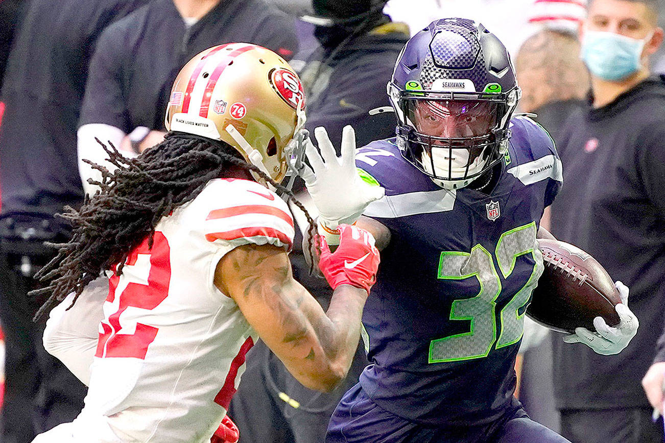 Seattle Seahawks running back Chris Carson (32) during an NFL football game against the San Francisco 49ers, Sunday, Jan. 3, 2021, in Glendale, Ariz. (AP Photo/Rick Scuteri)