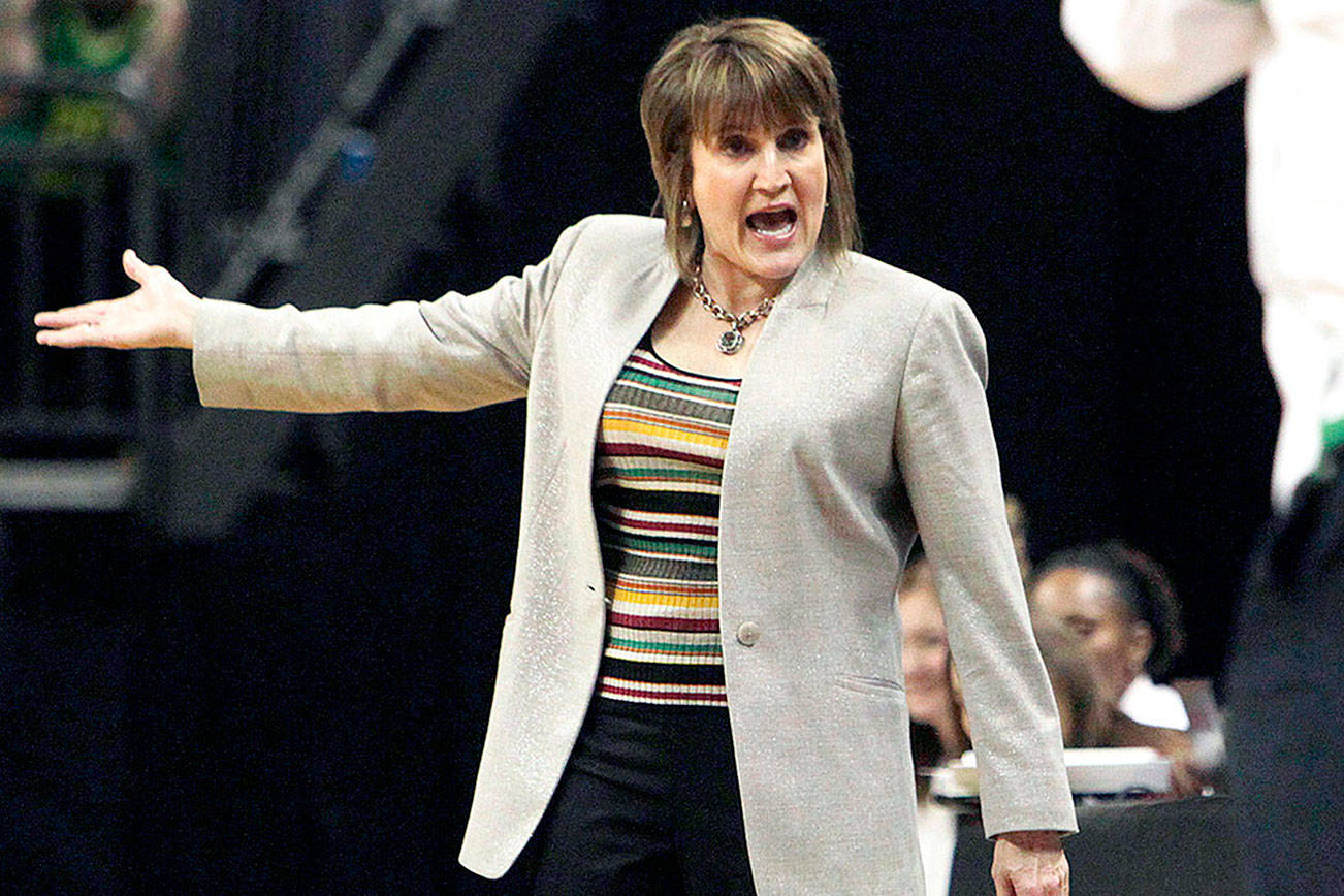 FILE - Washington State head coach Kamie Ethridge speaks with Oregon head coach Kelly Graves during an NCAA college basketball game in Eugene, Ore., in this Friday, Feb. 28, 2020, file photo. Washington State has earned its first ranking ever in The Associated Press women’s college basketball poll, entering at No. 25, Monday, Jan. 11, 2021. (AP Photo/Collin Andrew, File)
