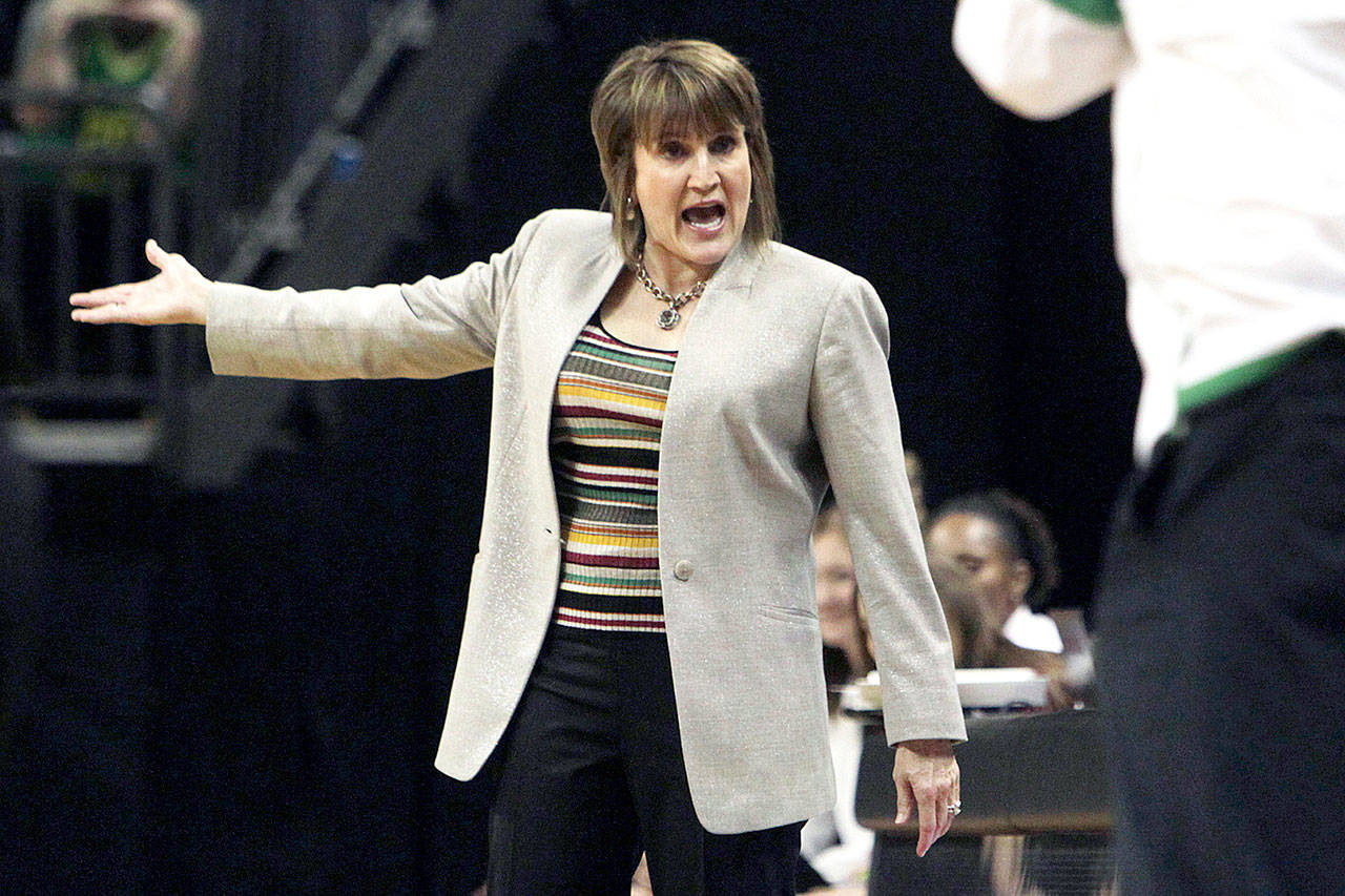 FILE - Washington State head coach Kamie Ethridge speaks with Oregon head coach Kelly Graves during an NCAA college basketball game in Eugene, Ore., in this Friday, Feb. 28, 2020, file photo. Washington State has earned its first ranking ever in The Associated Press women’s college basketball poll, entering at No. 25, Monday, Jan. 11, 2021. (AP Photo/Collin Andrew, File)