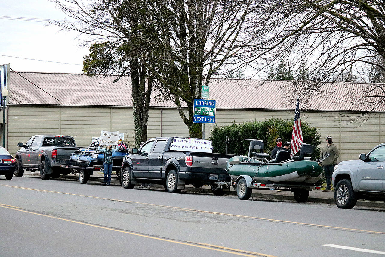 Outdoors enthusiasts rallied in Forks last week to protest steelhead fishing restrictions.