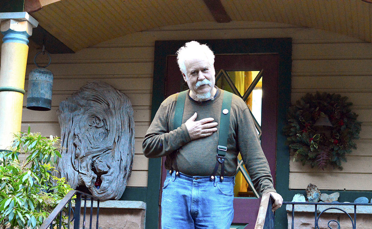 Doug Milholland of Port Townsend invites people to join him in ringing bells, playing instruments and singing at noon Friday in support of the U.N. Treaty on the Prohibition of Nuclear Weapons, which enters into force that day. (Diane Urbani de la Paz/Peninsula Daily News)
