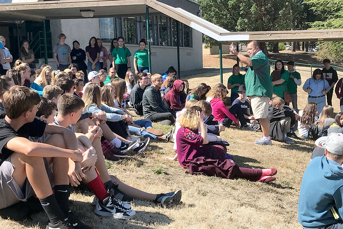 Port Angeles Athletic Director Dwayne Johnson speaks to a group of freshman during a pre-COVID orientation session. Johnson has received the Gareth Giles Memorial Award recognizing him for his leadership and dedication to Washington state students from the Washington Interscholastic Activities Association. (Port Angeles School District)