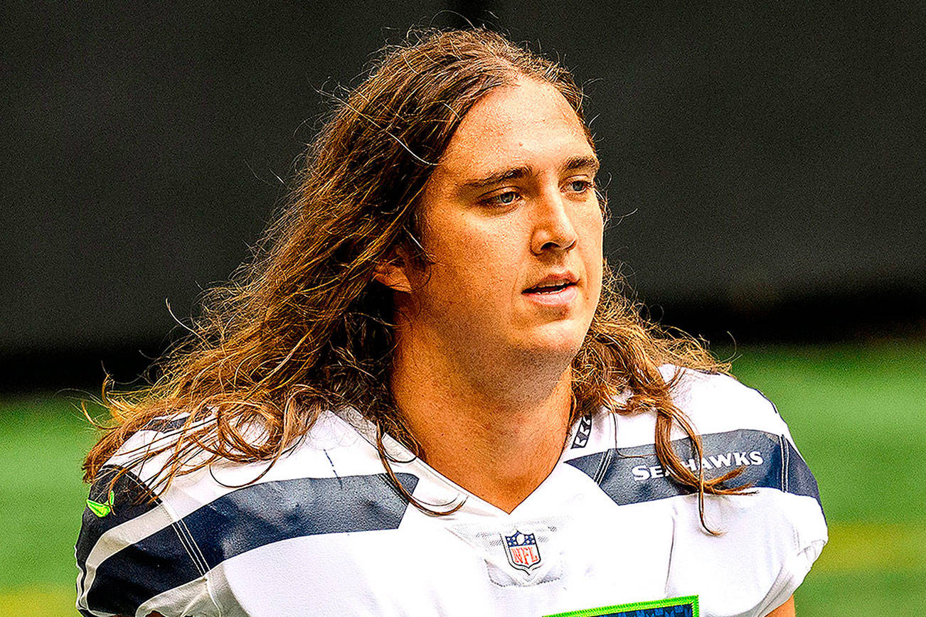 FILE - Seattle Seahawks offensive tackle Chad Wheeler (75) is shown before an NFL football game against the Atlanta Falcons in Atlanta, in this Sunday, Sept. 13, 2020, file photo. The Seattle Seahawks said Wednesday, Jan. 27, 2021, that offensive lineman Chad Wheeler is no longer a member of the team following his arrest last weekend for investigation of domestic violence. (AP Photo/Danny Karnik, File)