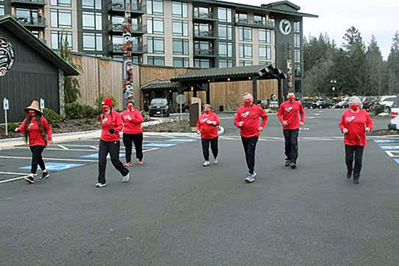Red, Set, Go Race and Heart Luncheon officials embark on a training run/walk on Saturday at 7 Cedars Casino and Hotel. From left are Loni Greninger, Jamestown Tribal Council; Victoria Jones, race director of the Red, Set, Go Heart Healthy Run/Walk/Swim; Lori Frederick, vice president of Strait View Credit Union, the presenting sponsor of the race; Karen Rogers, chair of the Red, Set, Go Luncheon; Bruce Skinner, OMC Foundation executive director; Darryl Wolfe, Olympic Medical Center CEO; and OMC Commissioner Jean Hordyk. (Courtesy of OMC Foundation)