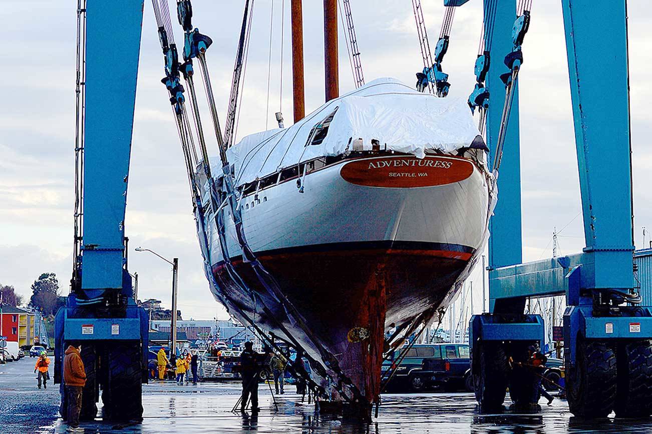 The Adventuress, a 108-year-old National Historic Landmark and nonprofit educational ship, was lifted into the Port Townsend Boat Haven on Monday morning. The schooner will receive its routine Coast Guard hull inspection and have its bottom painted. (Diane Urbani de la Paz/Peninsula Daily News)