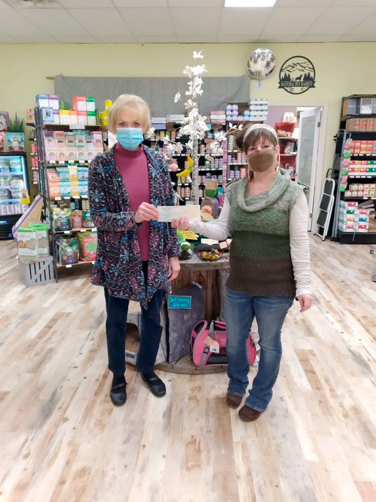 Danette Grady, executive director of Peninsula Friends Of Animals, on left, receives a $1,000 donation from Cynthia Tolman.

Tolman is the owner of Best Friend Nutrition: The Natural Pet Market.

According to a press release, the gift will be used to support the friends' mission to spay/neuter, rescue and arrange adoption for homeless, neglected or abused animals.