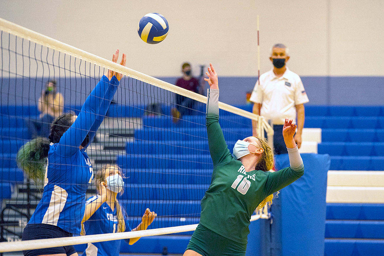 Steve Mullensky/for Peninsula Daily News

Port Angeles' Kennedy Bruch, 10, defends the net against East Jefferson Volleyball Team of Katie Ballard, left, and Sophie Patterson during a Tuesday game in Chimacum.