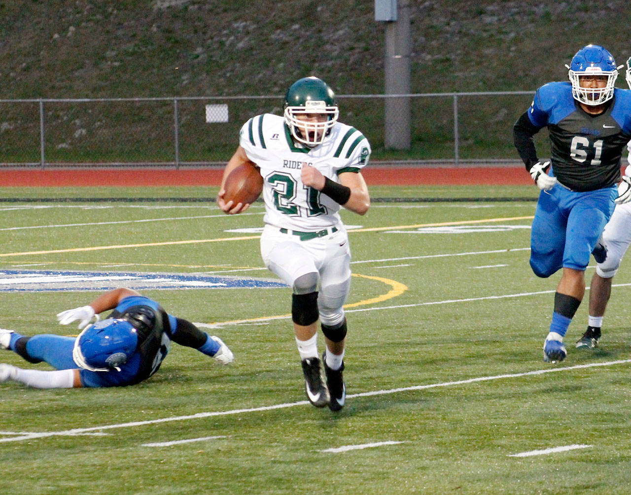 Port Angeles’ Daniel Cable ran for 133 yards in this 2019 contest against Olympic. (Mark Krulish/Kitsap News Group)
