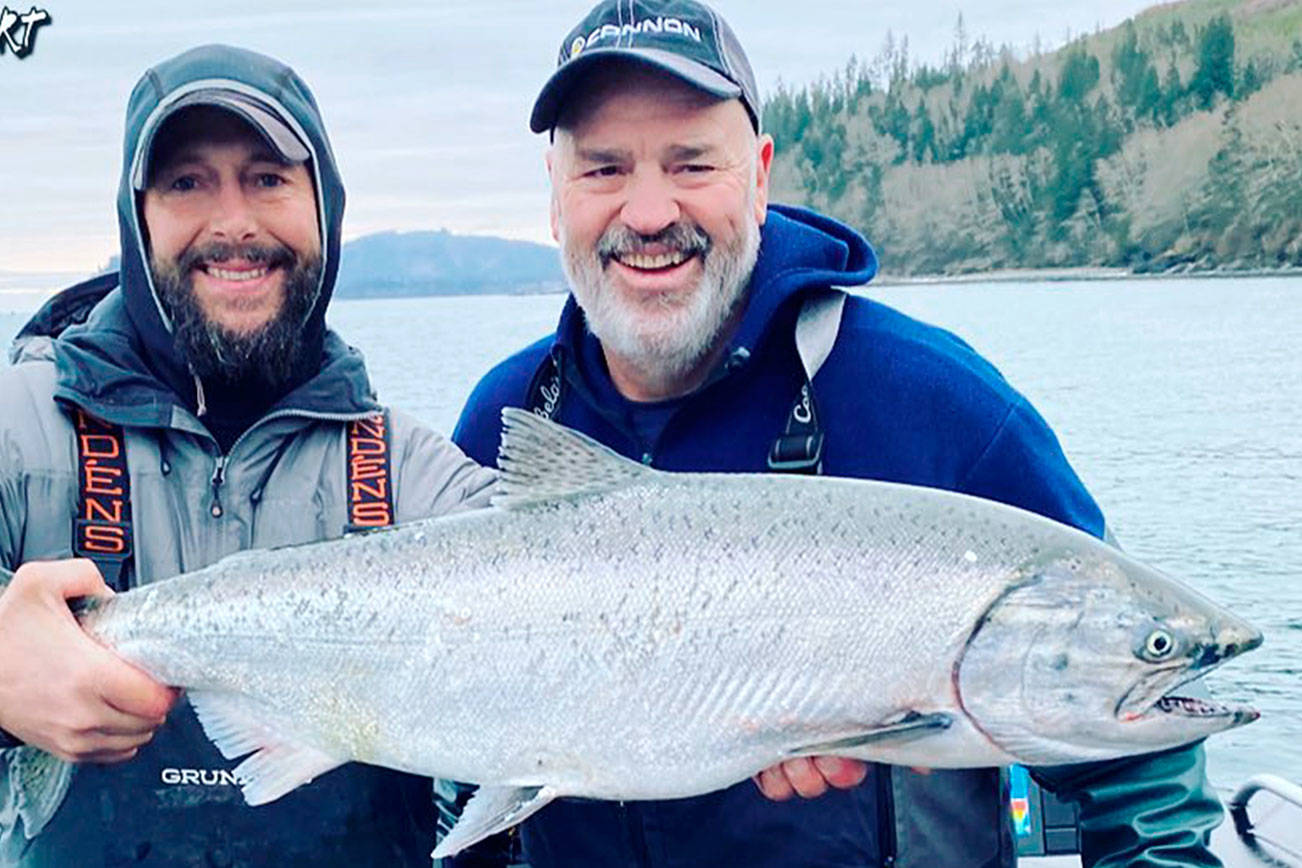 Joey Pyburn, left, and Tom Nelson, the host of 710 AM ESPN Seattle’s The Outdoor Line radio show, display a 17.5-pound blackmouth chinook caught while fishing out of Mason’s Resort in Sekiu. The blackmouth chinook fishery will run through April 30 in Marine Area 5. Neighboring Marine Area 6 (Eastern Strait of Juan de Fuca) and 9 (Admiralty Inlet) will not open for blackmouth fisheries this year. (Mason’s Resort)