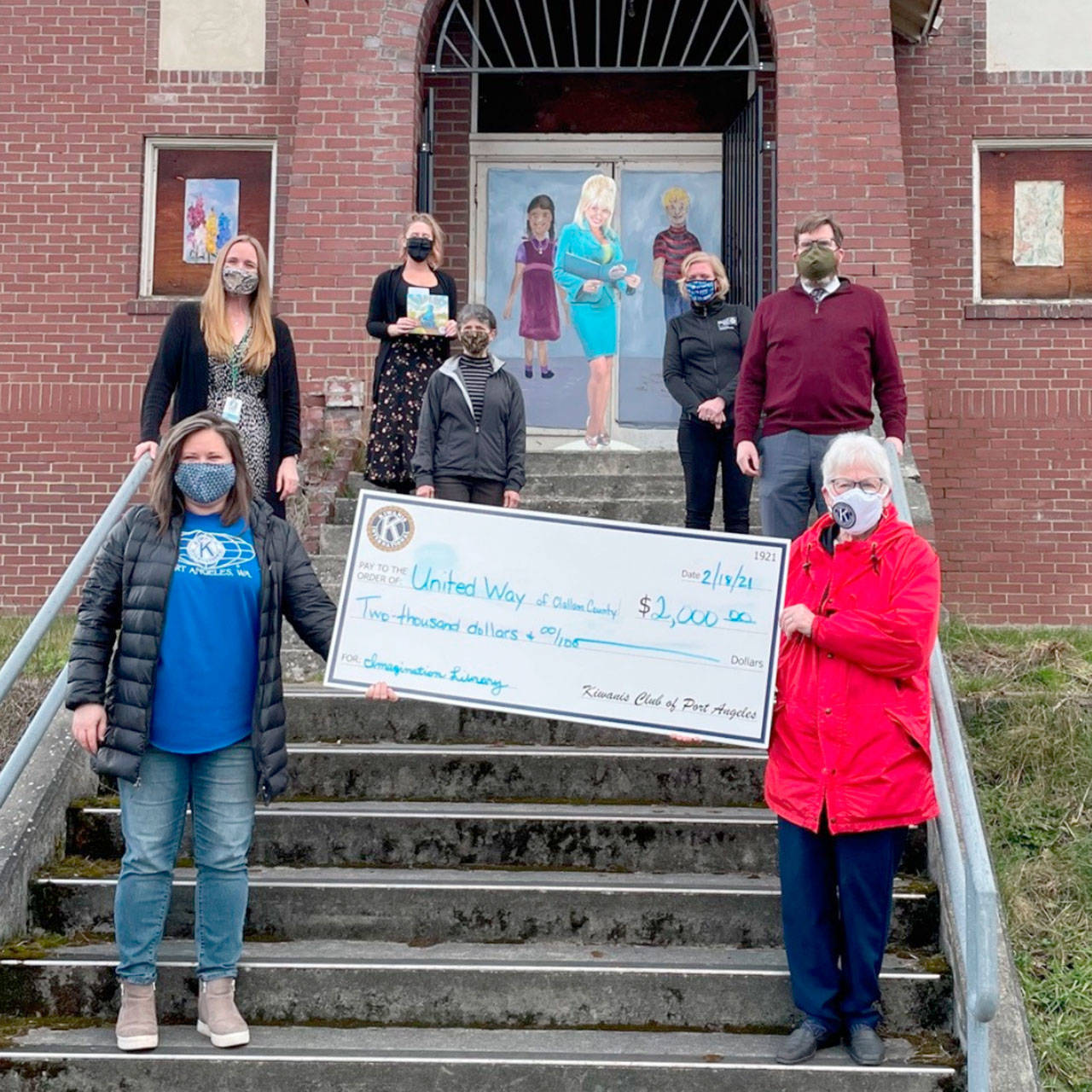 The Kiwanis Club of Port Angeles and the Kiwanis Foundation recently donated $2,000 to the North Olympic Library Foundation, the United Way of Clallam County, for the Dolly Parton Imagination Library. The book-gifting program will mail a book monthly to every child in the county who is younger than five.
In the bottom row, from left to right are Tasha Fitzgerald and Peggy Norris; in the middle row, left to right are Carmen Geyer, Nina Pitts and Patrick Irwin; and in the top row, from left to right, Sara Dutrow and Christy Smith.