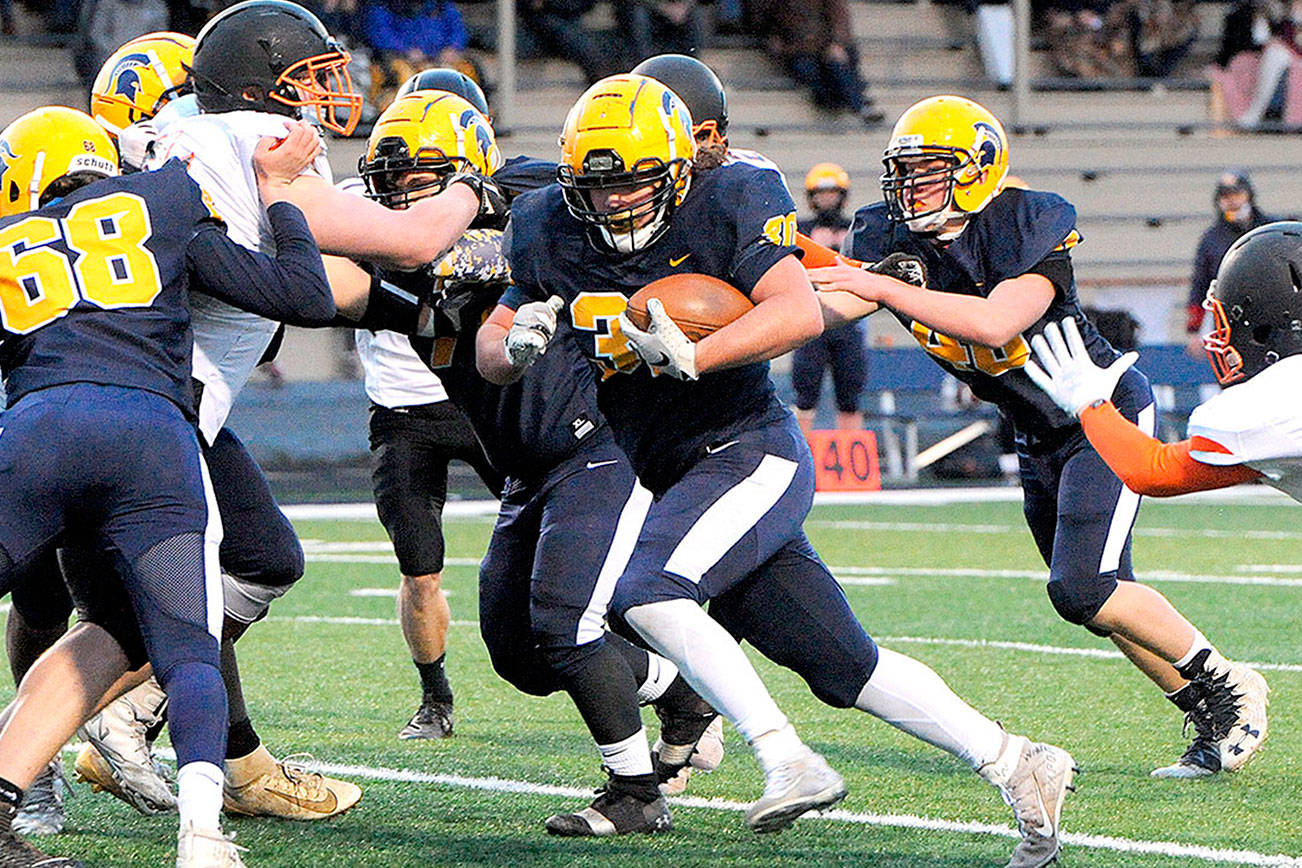 Spartan Hayden Baker (30) on his way to a touchdown against Napavine during the first quarter of play Friday evening on the turf at Spartan Stadium.  Photo by Lonnie Archibald.