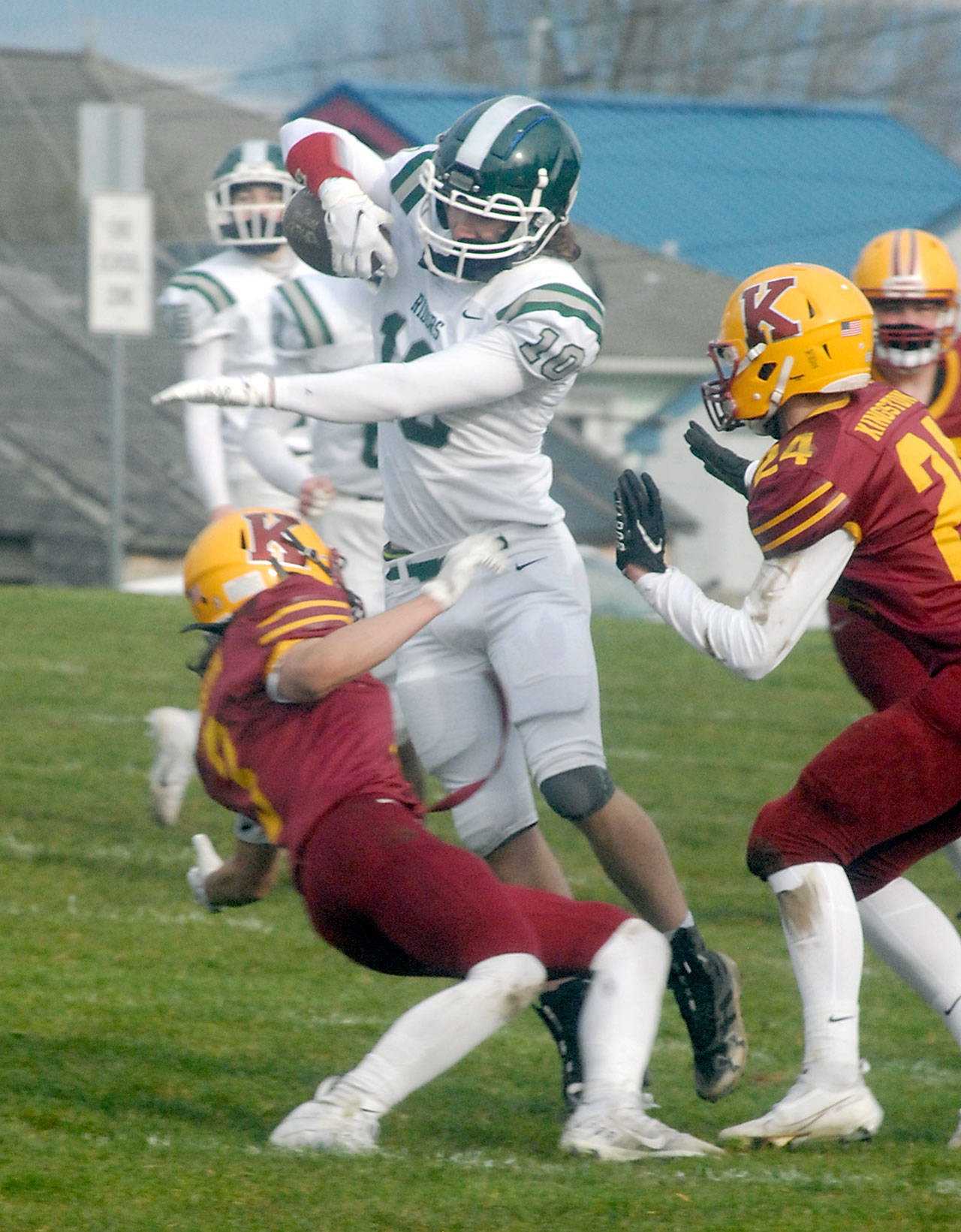 Port Angeles’ Ty Bradow, center, tries to evade the defense of Kingston’s Cade Claymore, left, and Noah Walter on Saturday at Stevens Middle School in Port Angeles. (Keith Thorpe/Peninsula Daily News)