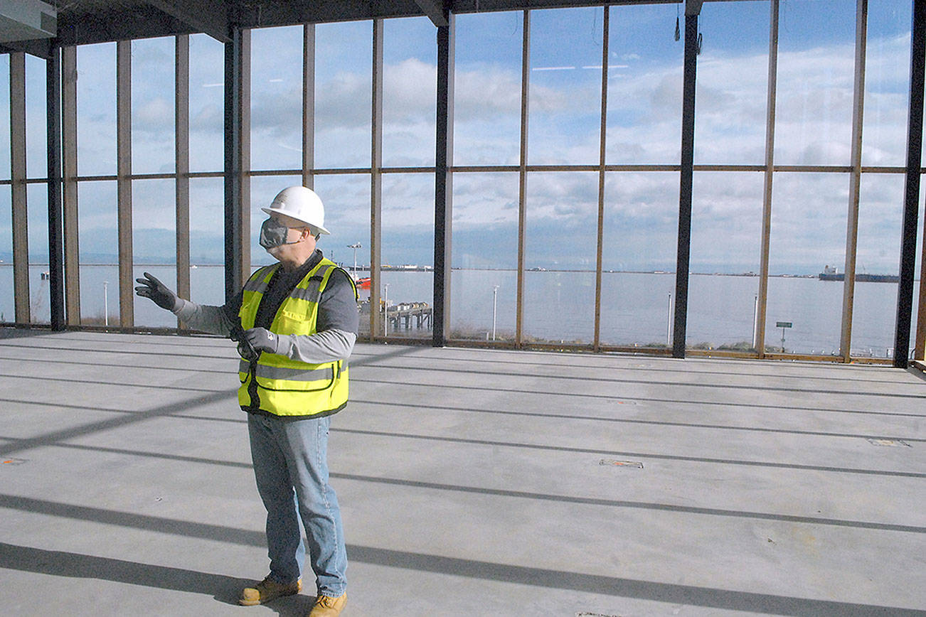 Chris Fidler, executive director of the Field Arts and Events Hall, stands in what will be a conference area during a tour of the Port Angeles facility on Friday. (Keith Thorpe/Peninsula Daily News)