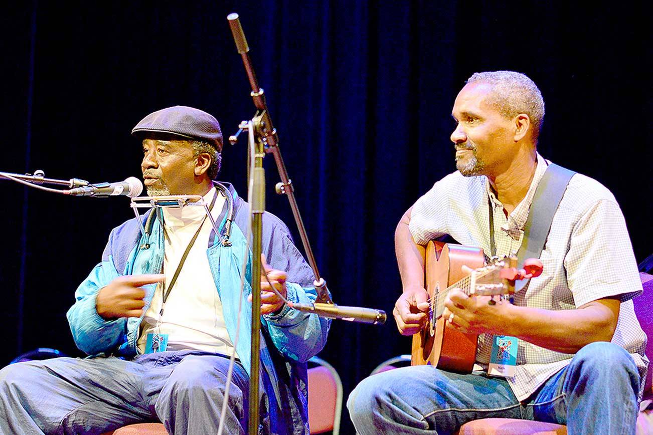 <strong>Diane Urbani de la Paz</strong>/Peninsula Daily News
 Mark Puryear, right, seen with Terry Harmonica Bean in 2019, will be among the teaching artists in Centrum’s Acoustic Blues workshop this summer.