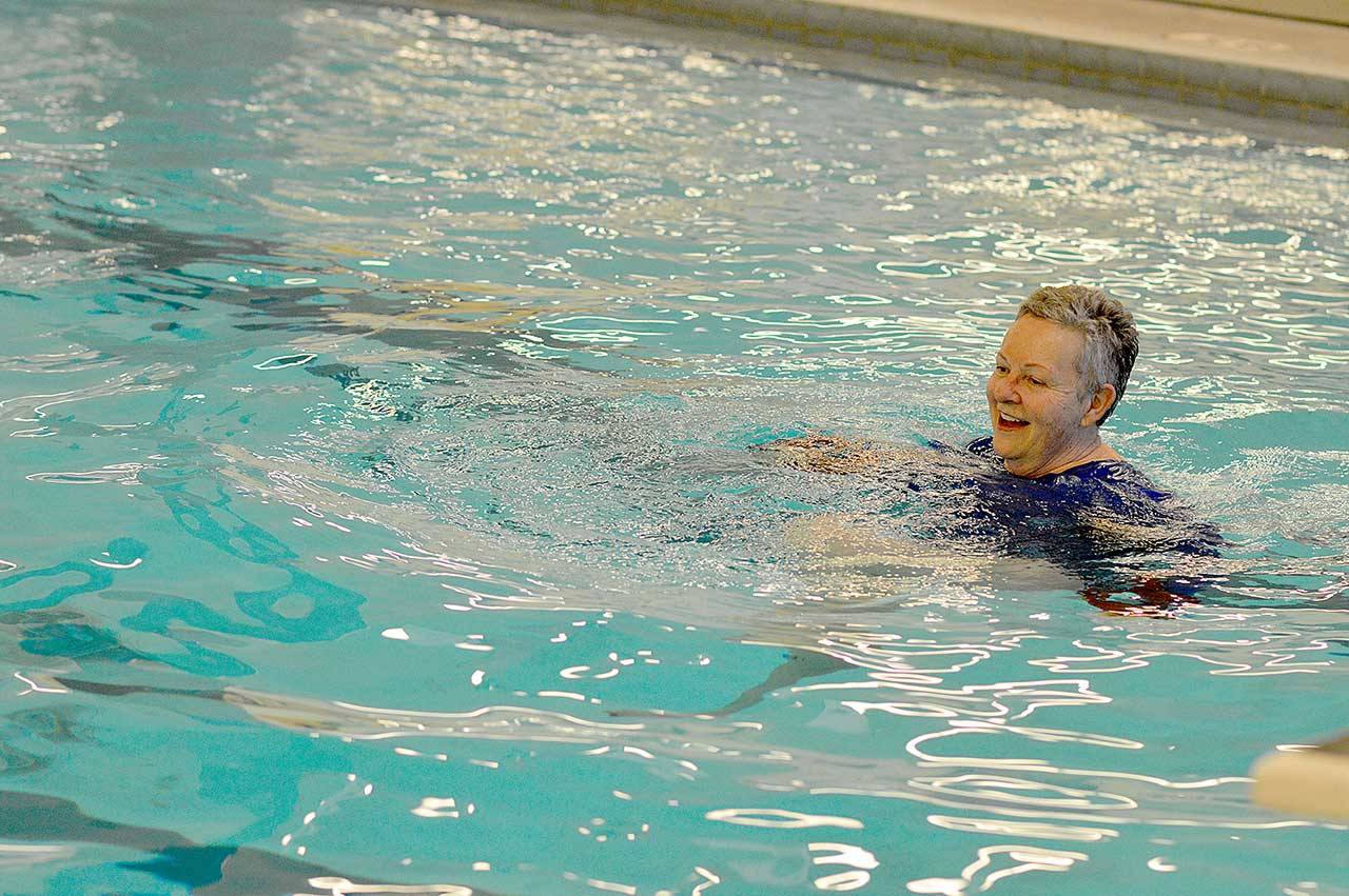 Houlton Madinger of Port Townsend is among the first to enjoy the Mountain View Pool’s 84-degree water Monday morning. The city pool, at 1925 Blaine St., has reopened for lap swimming and independent water aerobics — by reservation — from 7 a.m. to 11 a.m. Monday through Friday. For more information, visit cityofpt.us/pool or phone 360-385-POOL (7665). (Diane Urbani de la Paz/Peninsula Daily News)