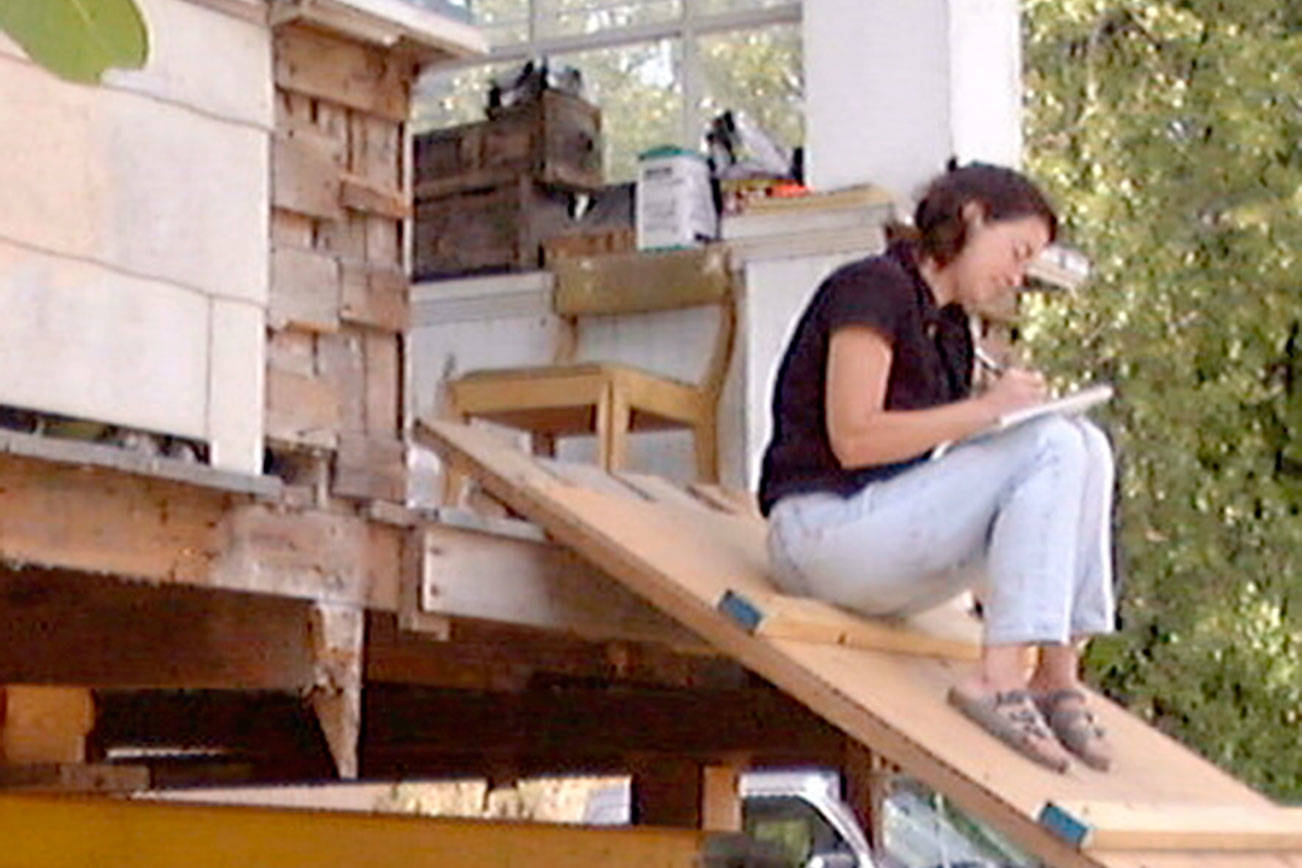 Erica Bauermeister, seen in August 2001 while renovating her house, will give a talk online tonight about her book, “House Lessons: Renovating a Life.” (Photo courtesy of Ben Bauermeister)