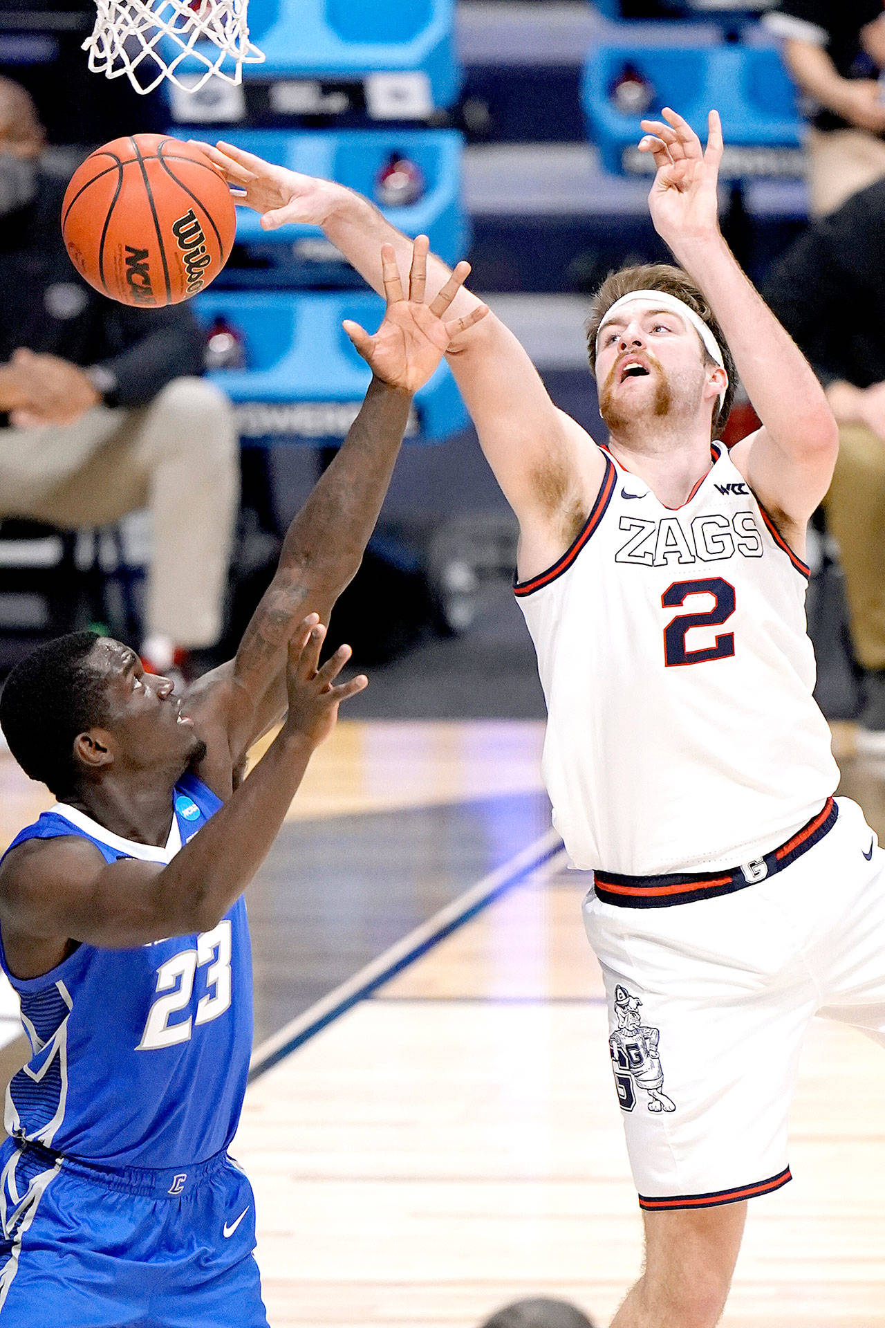 Creighton forward Damien Jefferson (23) and Gonzaga forward Drew Timme (2) battle for a loose ball in the second half of a Sweet 16 game in the NCAA men’s college basketball tournament at Hinkle Fieldhouse in Indianapolis on Sunday. (AJ Mast/The Associated Press)
